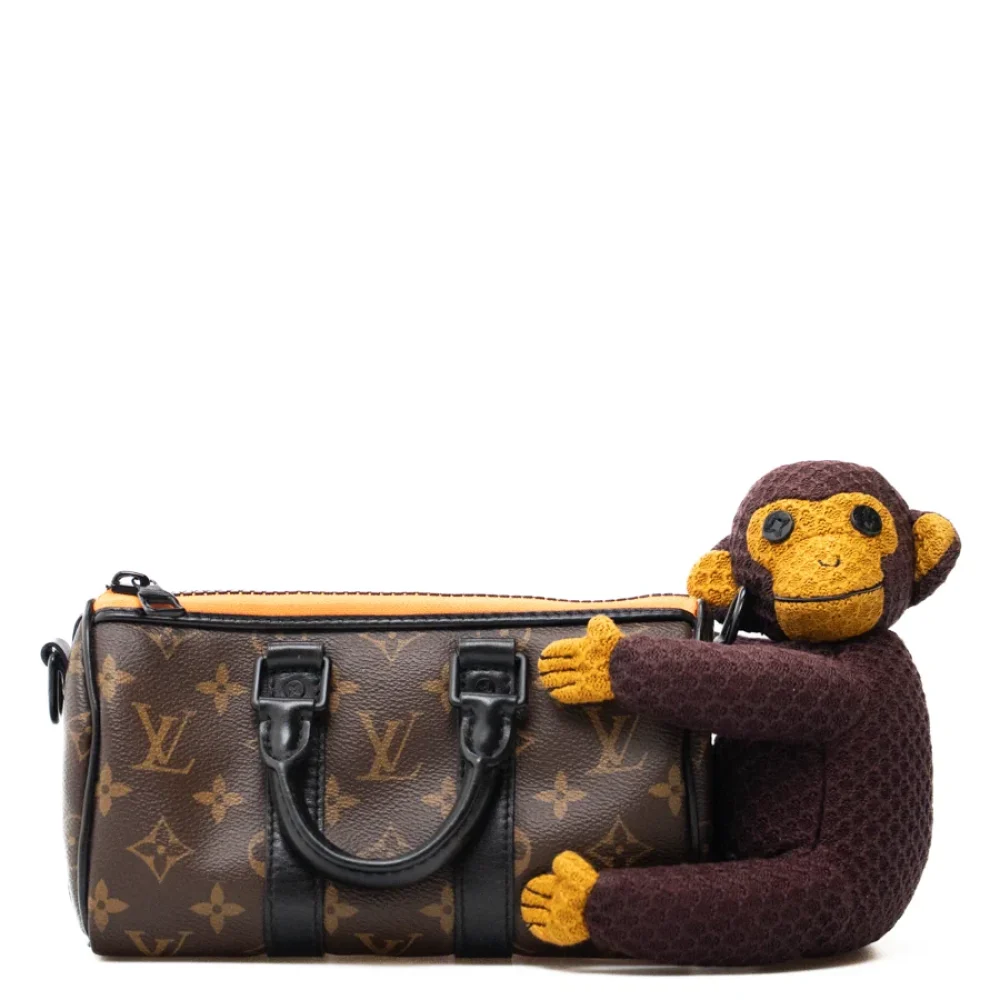 Luxury Mood_ LOUIS VUITTON_ keepall xs monkey puppet monogram e pelle nera_ 004